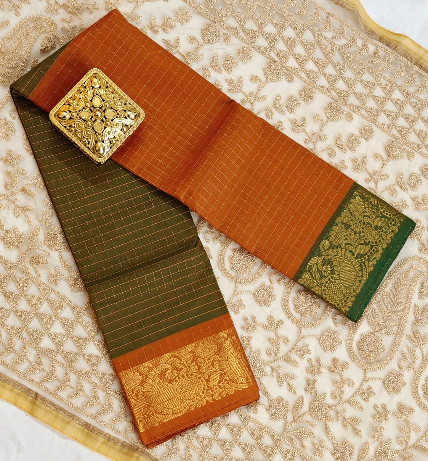 Sungudi Zari – Off and Off Series | orange & olive green Checked Cotton Saree"