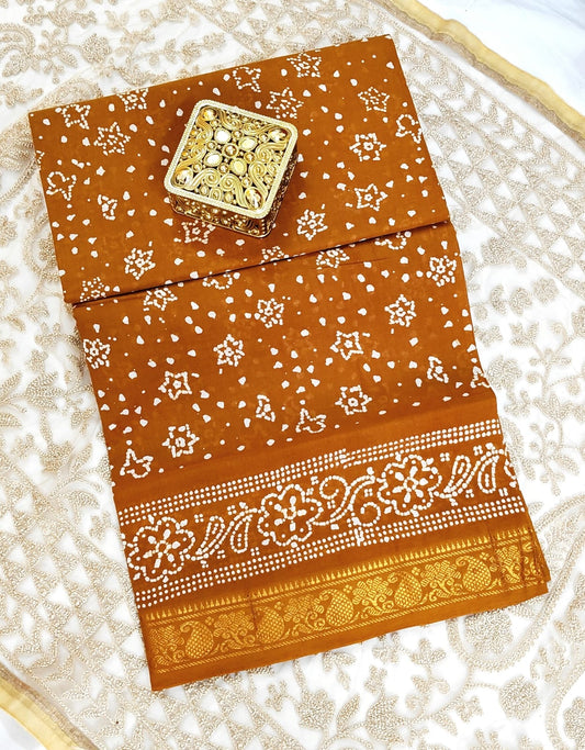 "Earthy Elegance – Rust brown Bandhani Saree with Floral Zari Border"