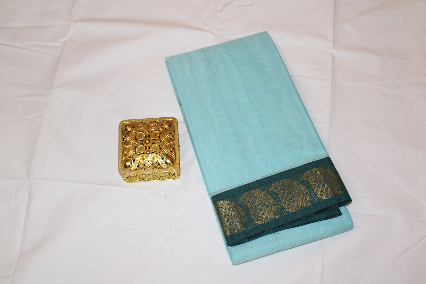 "Grace in Simplicity – Sky Blue Cotton Saree with Zari Elegance"