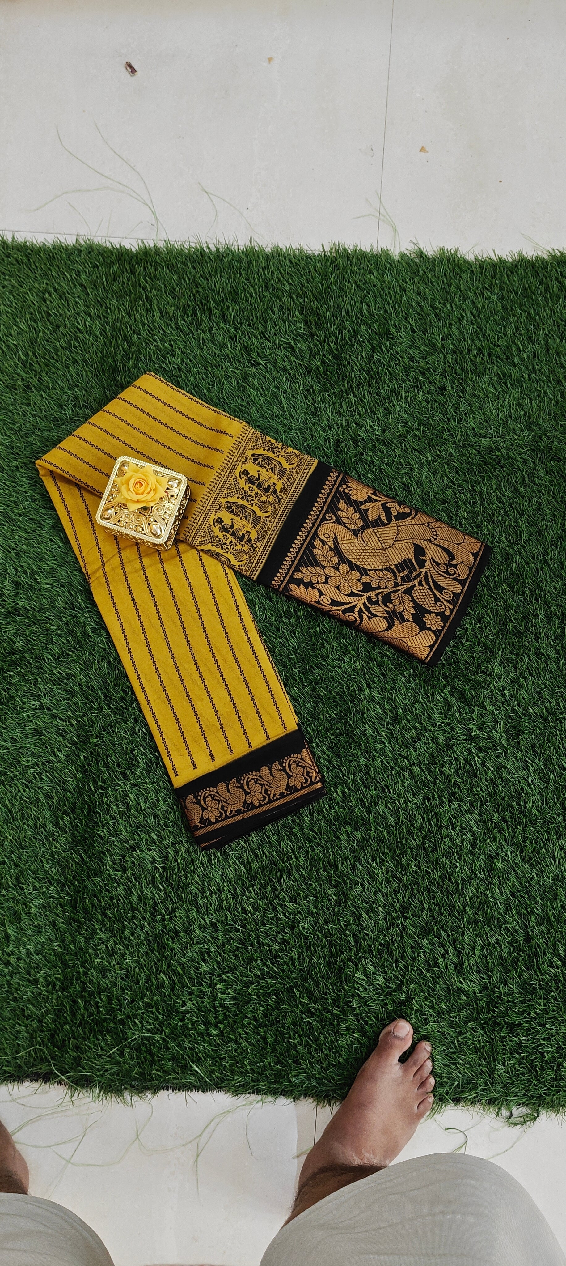 Mustard cotton saree with black peacock zari border