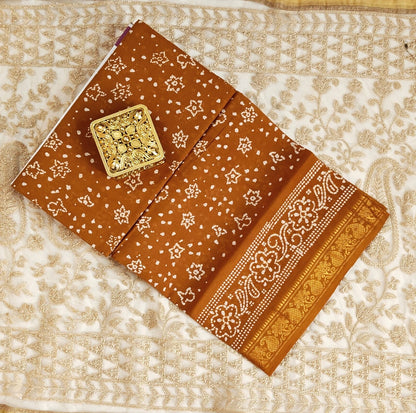 "Earthy Elegance – Rust brown Bandhani Saree with Floral Zari Border"