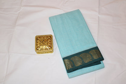 "Grace in Simplicity – Sky Blue Cotton Saree with Zari Elegance"